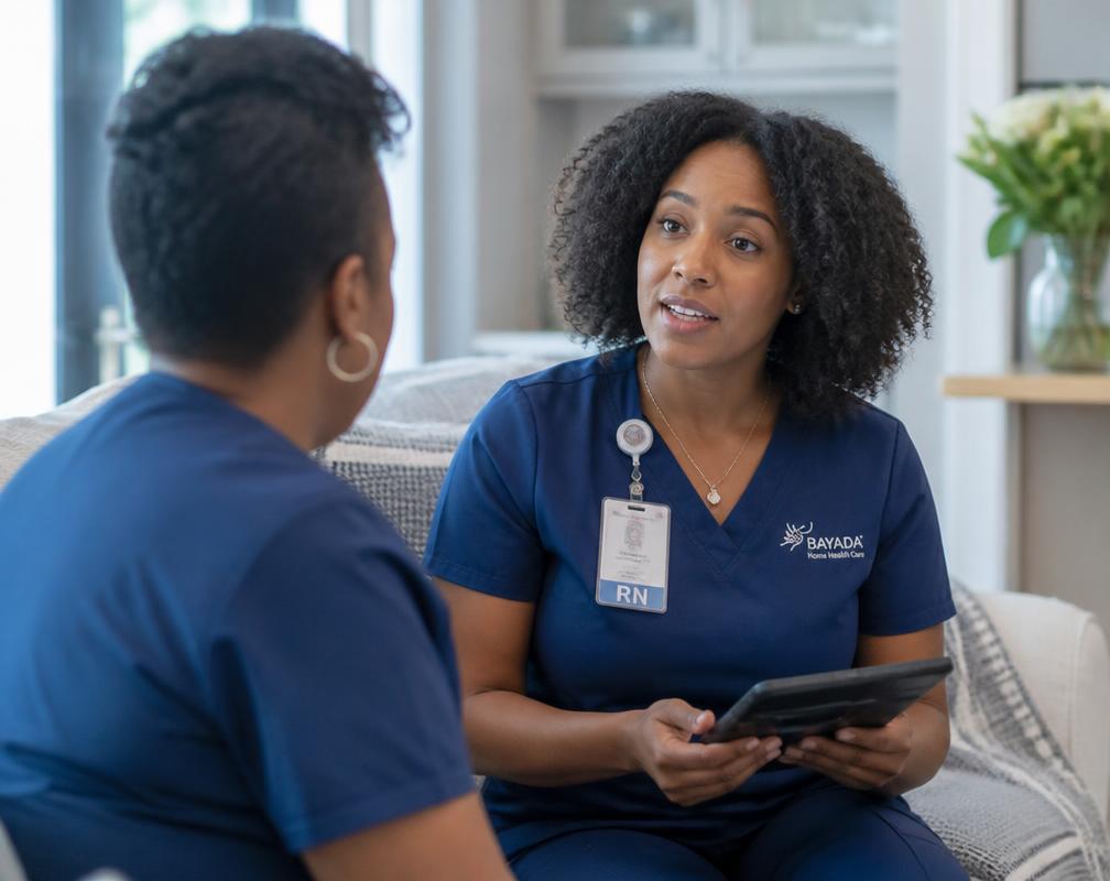 Home health nurses discussing a patient plan